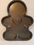 Wilton Gingerbread Man Baking Sheet 14 1/2" Tall Cookie Cake Kitchen Chef Baker. Fixed Price $18.45.
