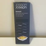 Joseph Stretch Expandable Heat Resistant Pot Stand Black Trivet Hot Plate. Fixed Price $23.99.