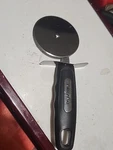 Farberware Professional Pizza Cutter Stainless Steel Blade W/ Finger Guard. Fixed Price $12.00.