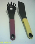 Joseph Kitchen One Purple Spaghetti Server And Yellow Flexible Turner. Fixed Price $8.00.