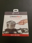 Aris Simmer Mat The Original Design Any Cooking Surface 8". Fixed Price $23.65.