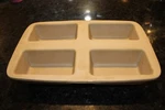 Pampered Chef #1418 Family Heritage Classics Stoneware Mini-loaf Pan. Fixed Price $44.95.