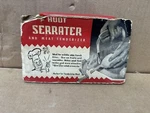 Vintage Huot Serrater & Meat Tenderizer Original Package Red Plastic Handle. Fixed Price $10.95.