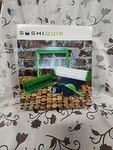 Sushiquik Making Kit Including Roll Cutter, Rice Paddle And Frame. Fixed Price $29.00.
