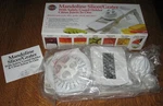 Norpro Mandolin Slicer/grater-brand New Box!. Fixed Price $12.00.