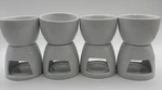 Set Of 4 Crate And Barrel Oz Butter Warmer / Fondue Pots One Chipped. Fixed Price $29.00.