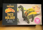 New Itek Dinosaur Taco Holder - Unopened Box Great Gift For Kids Of Any Age!. Fixed Price $9.49.