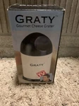 Graty Gourmet Cheese Grater "as Seen Tv" Coase, Fine & Bonus Slice Blade J. Fixed Price $13.00.