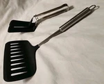 Wolfgang Puck Two Piece Utensil Set Wide Turner & Tong Stainless Steel/silicone. Fixed Price $28.99.