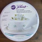 Wilton Trim 'n Plus Cake Turntable Non Slip Base 307-303 Decor Nip New. Fixed Price $10.50.