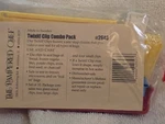 New Pampered Chef Twixit Clip Set #2643. Blue, Red, Yellow And White Retired. Fixed Price $25.00.