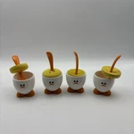 Joie 4 Egg Head Cup And Spoon Set. White With Orange. Foam Holders.. Fixed Price $7.99.