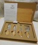 New Ubs Cheese Charcuterie Cutting Bamboo Board & 4PC Knife Set Swiss. Fixed Price $21.00.