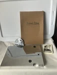 Michael Aram Swiss Cheese Cutting Board & Knife Polished Stainless Steel New. Fixed Price $35.00.