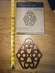 Pampered Chef 2009 Round Up From The Heart 2943 Cast Metal Trivet 10" X 6" Nib. Fixed Price $10.00.