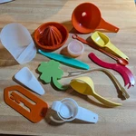 15 Piece Lot Of Various Vintage Tupperware Items Gadgets. Fixed Price $40.00.