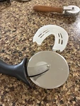 The Pampered Chef Stainless Steel Pizza & Crust Cutter With Blade Cover #1303. Fixed Price $14.99.