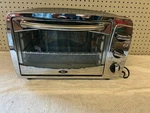 Oster Toaster Oven Stainless Steel Silver Front Model TSSTTV0001 6 Slice. Fixed Price $80.00.