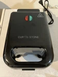 Curtis Stone Stuffed Sandwich Maker Black New Never Used, Opened Box. Fixed Price $20.00.