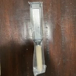 Kitchenaid-hand Held Fine 2- Way Paddle Grater/zester Almond Cream #KE321BKAC. Fixed Price $10.00.