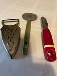 Three Piece Very Old Cheese Grator Slicer And Peeler Dough Cutter. 1220. Fixed Price $12.00.