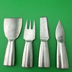 Oggi 4-PIECE Stainless Steel Cheese Knife Set. Fixed Price $9.95.