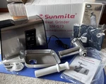 Sunmile SM-G73 Electric Meat Grinder Stainless Steel With Tray, Pusher, Blades. Fixed Price $65.00.