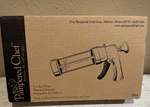 The Pampered Chef Cookie Press #1525 With 16 Designer Disks. Fixed Price $24.00.