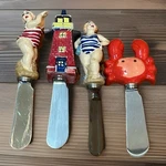 Vtg 90 Cheese Spreader Knives Boston Warehouse Ocean Beach Theme Set Of 4. Fixed Price $9.95.