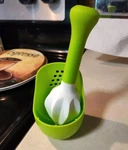 Smart Home Citrus Reamer With Convenient Stand Strainer, Dishwasher Safe. Fixed Price $5.99.