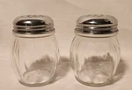 Pair Clear Glass Parmesan Cheese Shakers W/ Metal Tops Usa. Fixed Price $10.95.