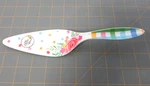 The Pioneer Woman Cake & Pie Server Multicolor Floral Melamine Brand New!. Fixed Price $9.00.